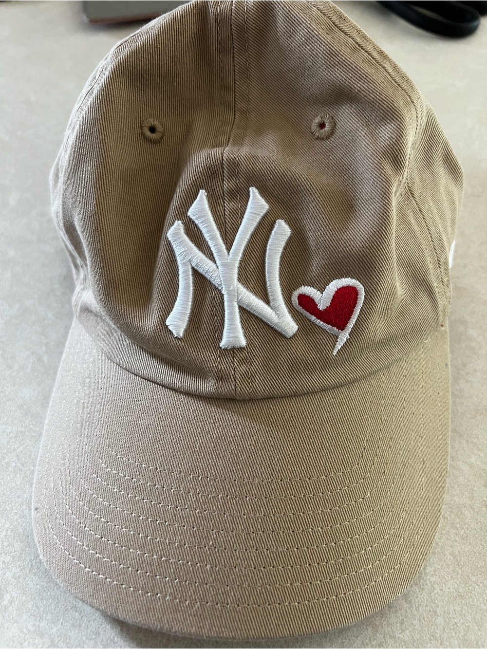 Yankee’s Tan Baseball Cap with Red Heart Accent